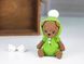 Іграшка в'язана HandiCraft Ведмедик коричневий у зеленому комбінезоні 380041804 фото 1